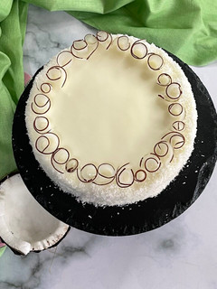 A picture of Coconut and Mango Breeze Cake.
