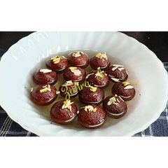 A picture of Gulab Jamun with milk powder.