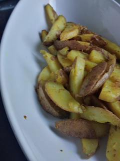Una foto de Papas doradas al curry