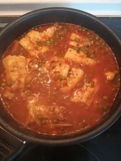 Una foto de Merluza con tomate