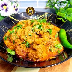 A picture of Dhaba Style Mutton Masala Curry.