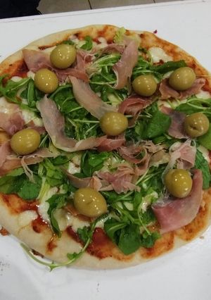 Una foto de Pizza en dos simples pasos