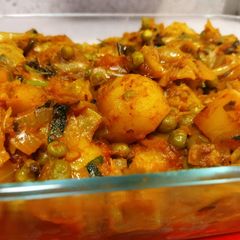 A picture of Cabbage with peas & potatoes.
