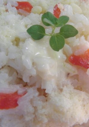 Una foto de Arroz blanco con mucho queso