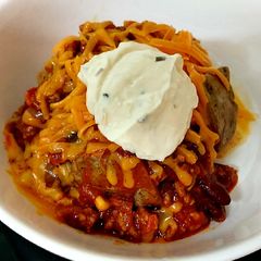 A picture of My Mexican Inspired Pork + Beef Salsa on a Jacket Potato.
