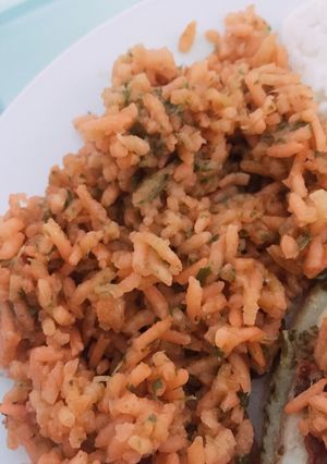Una foto de Arroz rojo con perejil