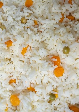 A picture of White rice with veggies.