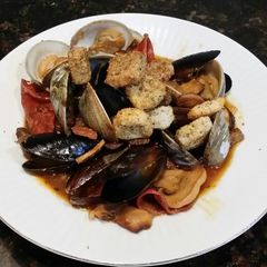 A picture of Brad's steamed mussels & clams w/ chorizo, lemon & sherry.