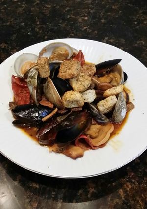 A picture of Brad's steamed mussels & clams w/ chorizo, lemon & sherry.