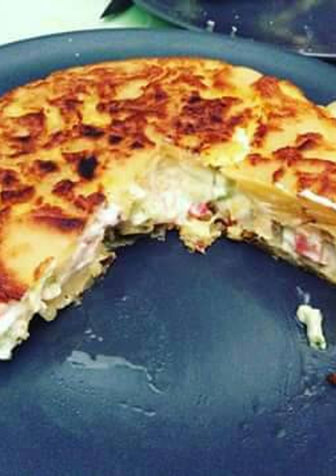 Una foto de Tortilla de patata rellena