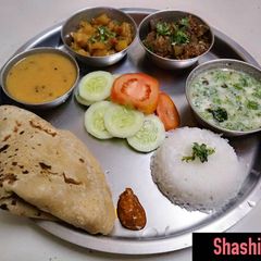 A picture of Turai, aloo sabji & kadai.