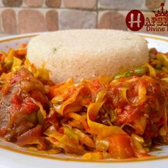 A picture of Steamed coarse rice(dambu) and beef cabbage sauce.