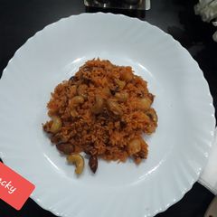 A picture of Meetha pualav in pressure cooker.