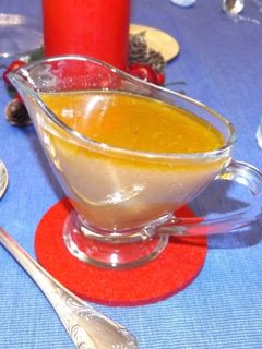 Una foto de Gravy. Salsa especial de pollo para asados