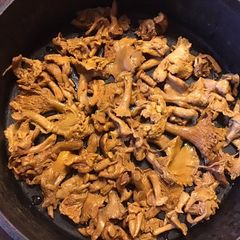 A picture of California Farm Chanterelle Mushrooms in Butter.