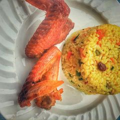 Fried rice and chicken A picture of Fried rice and chicken.