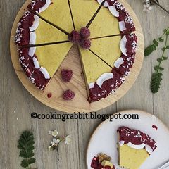 Mango cake with raspberry sauce A picture of Mango cake with raspberry sauce.