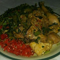 A picture of Vegetable Chicken sauce with ugba n pepper.
