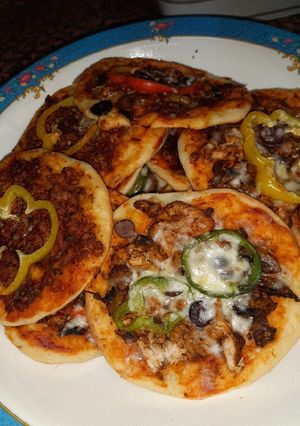 صورة لوصفة بيتزا وفطائر اللحم 😋
