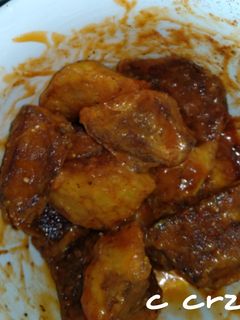 Una foto de Patatas con tomate