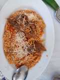 Arroz de tomate com carne estufada