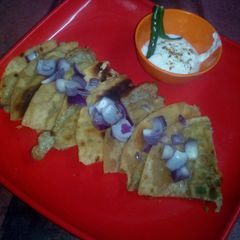 A picture of Packet egg fried roti.