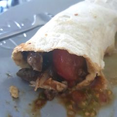 A picture of My Steak & Onion wrap with a Tennessee whisky Beef Sauce.😊.