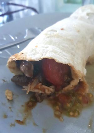 A picture of My Steak & Onion wrap with a Tennessee whisky Beef Sauce.😊.