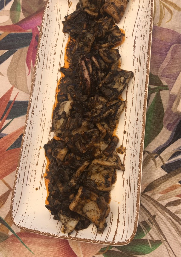 Una foto de Calamares en su tinta