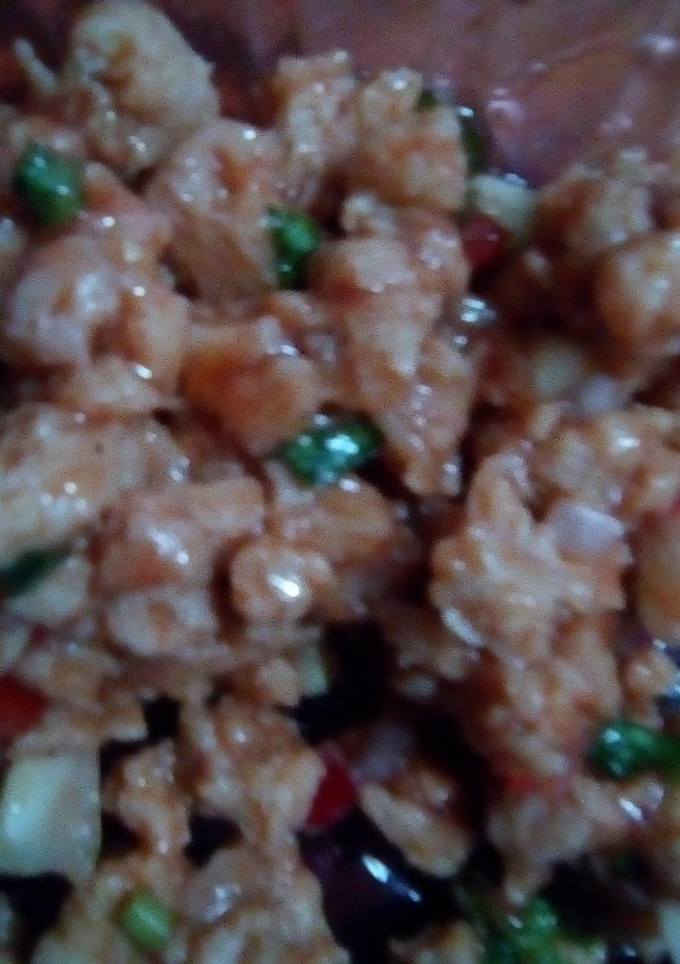 Una foto de Cocinando a manera