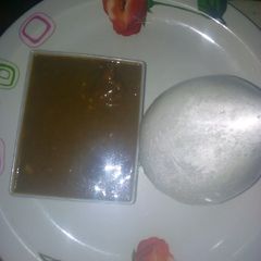 A picture of Tuwon shinkafa with baobab soup.