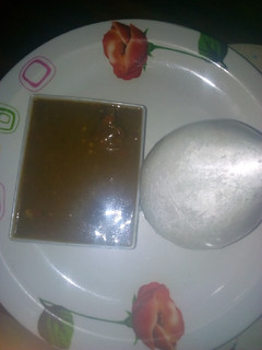 A picture of Tuwon shinkafa with baobab soup.