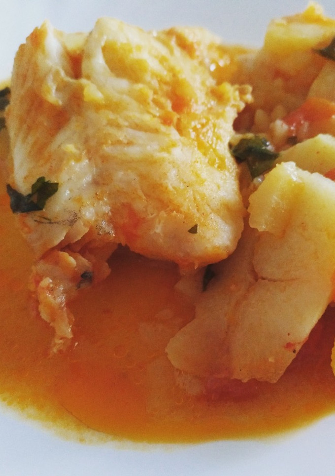 Una foto de Merluza con patatas