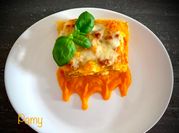 Una foto di lasagna zucca