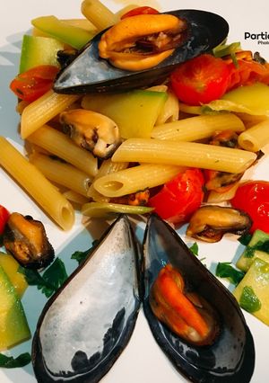 Foto di Penne con cozze e zucchine