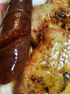 Una foto de Adobo con chorizos al vino