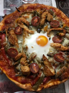 Una foto de Pizza campera