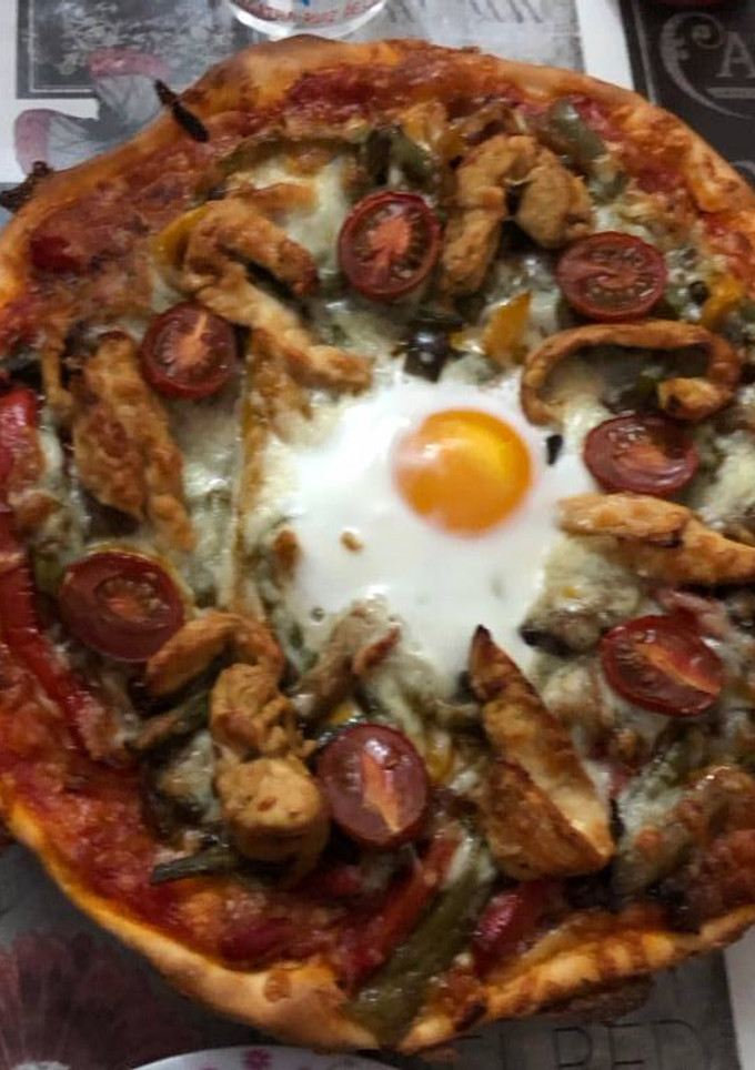 Una foto de Pizza campera