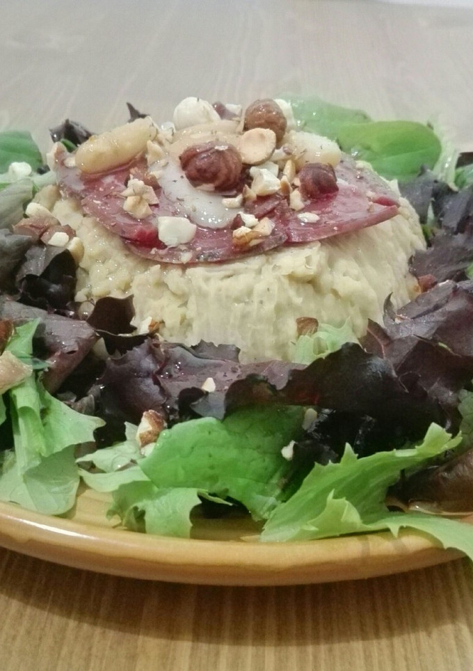 Una foto de Puré de judías blancas con jamón de pato
