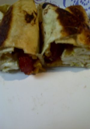 A picture of Breakfast in a tortilla.