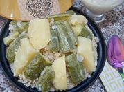 Une photo de mijoteuse couscous