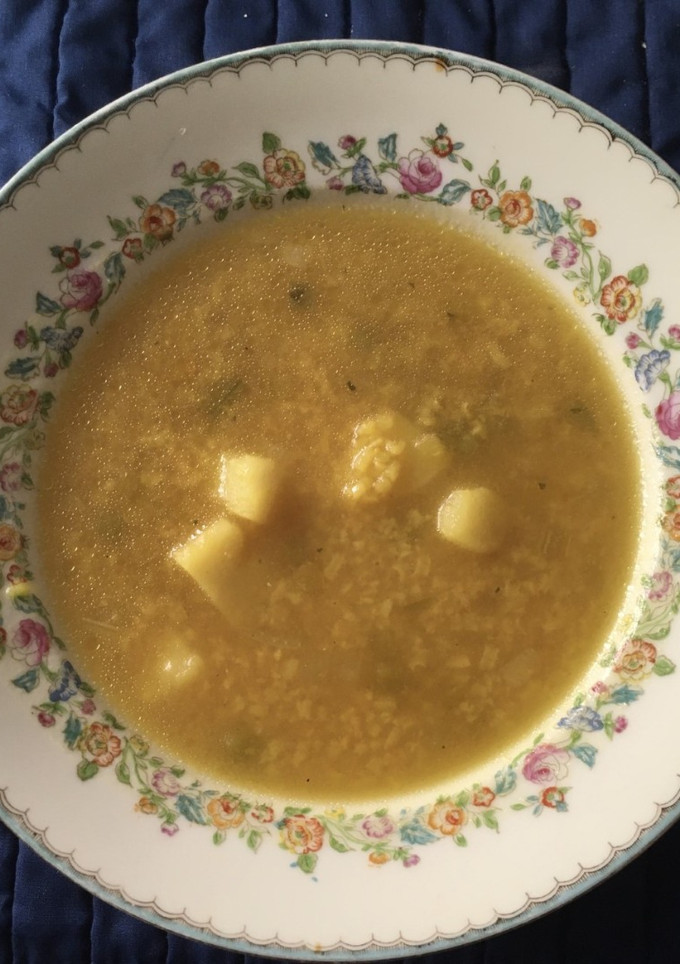 Una foto de Sopa de arroz con papa