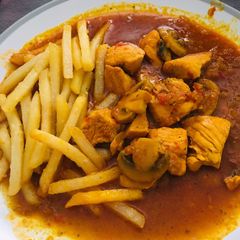 A picture of Chicken with tomato sauce.