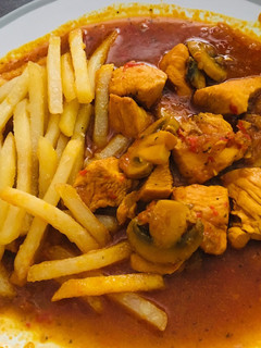 A picture of Chicken with tomato sauce.