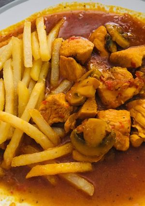A picture of Chicken with tomato sauce.