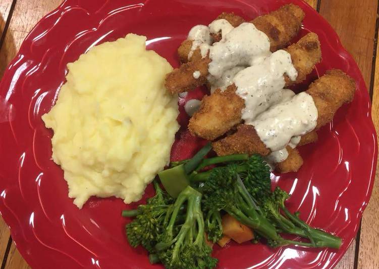 ParmFish fingers served with creamy mash and assorted vegetables