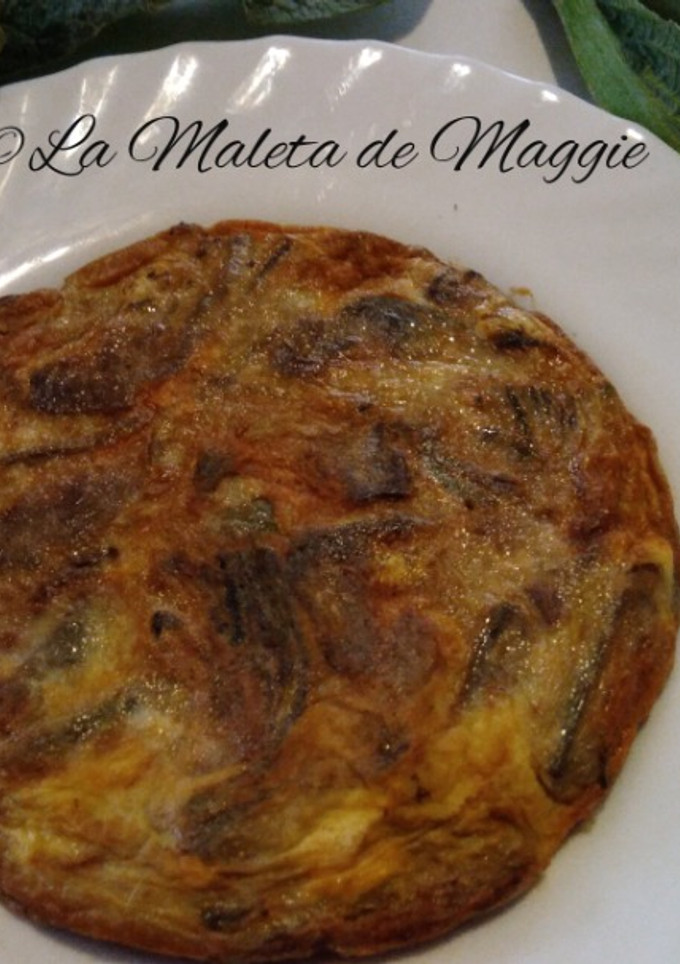 Una foto de Tortilla de alcachofas y jamón
