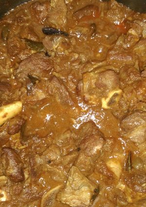 A picture of Mutton curry in pressure cooker.
