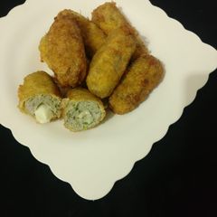 A picture of Cheesy chicken rolls.