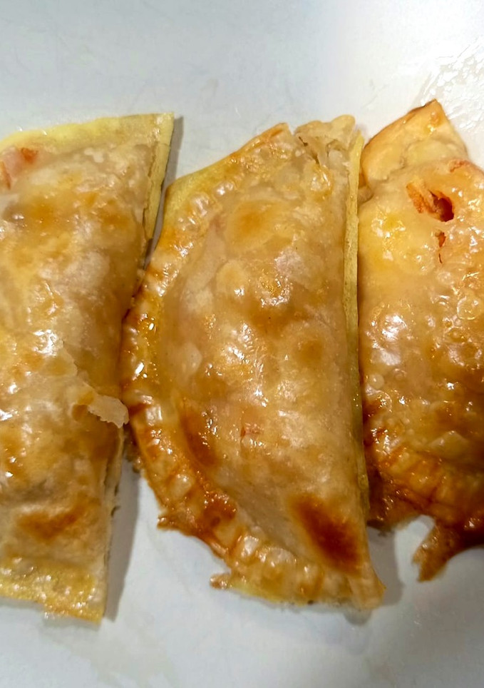 Una foto de Empanadillas de atún con huevo duro y tomate